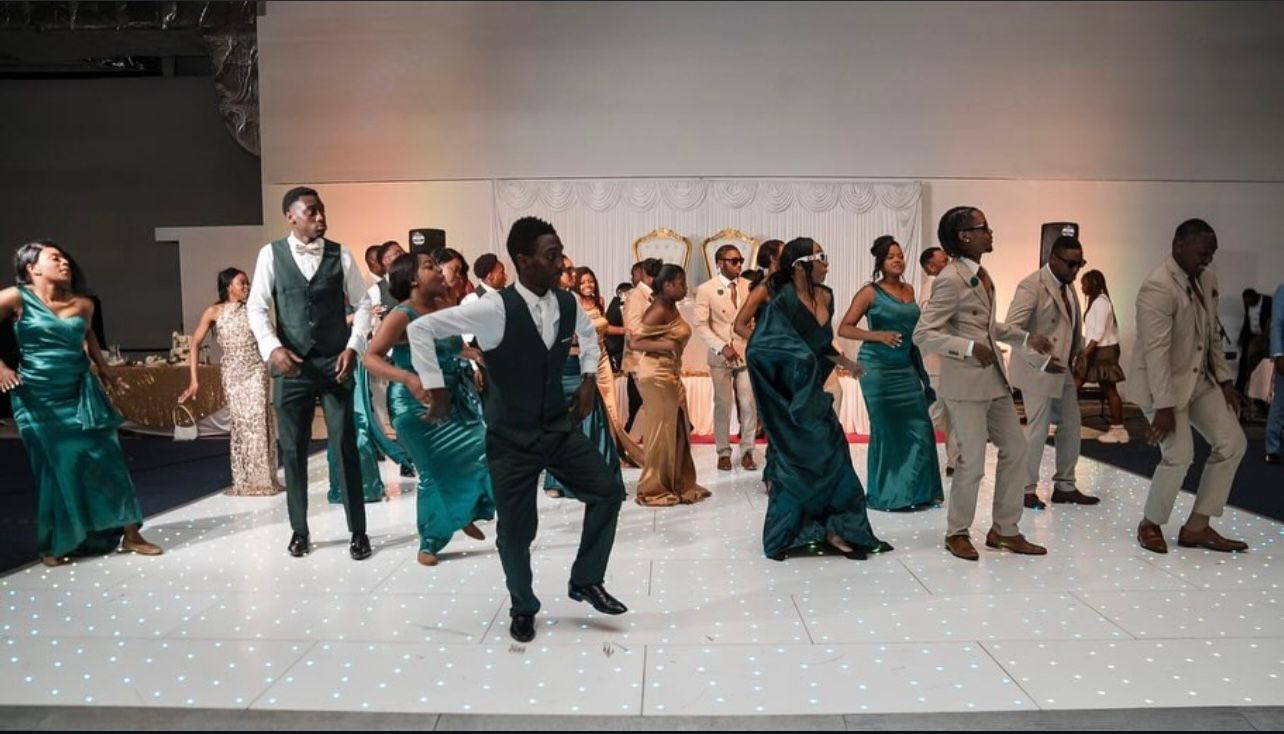Teal bridesmaids and groomsmen choreography